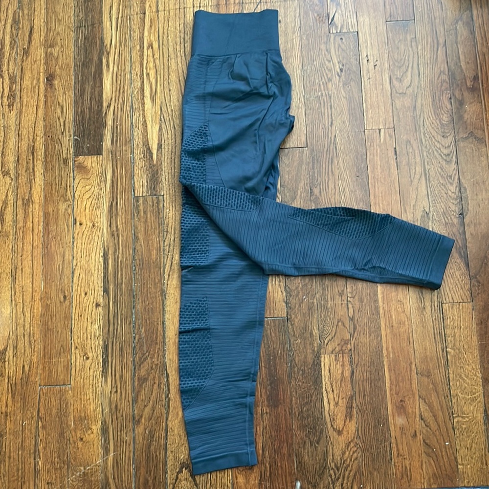 Zyia legging with mesh cutouts through hips and legs
